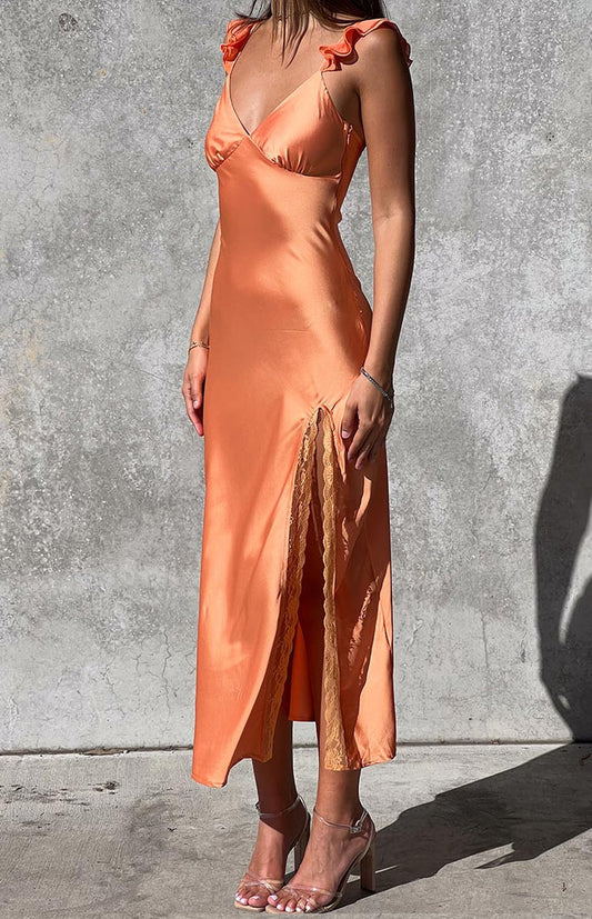 Beginning Boutique Wendy Orange Maxi Dress orange satin V-neck maxi dress with ruffled spaghetti straps and lace-trimmed side slit