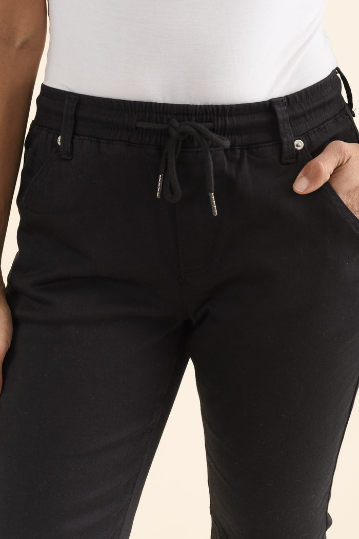 Whistler Black Cotton Jogger Pants,brunette model,Close up of outfit,alt text|model:Cara