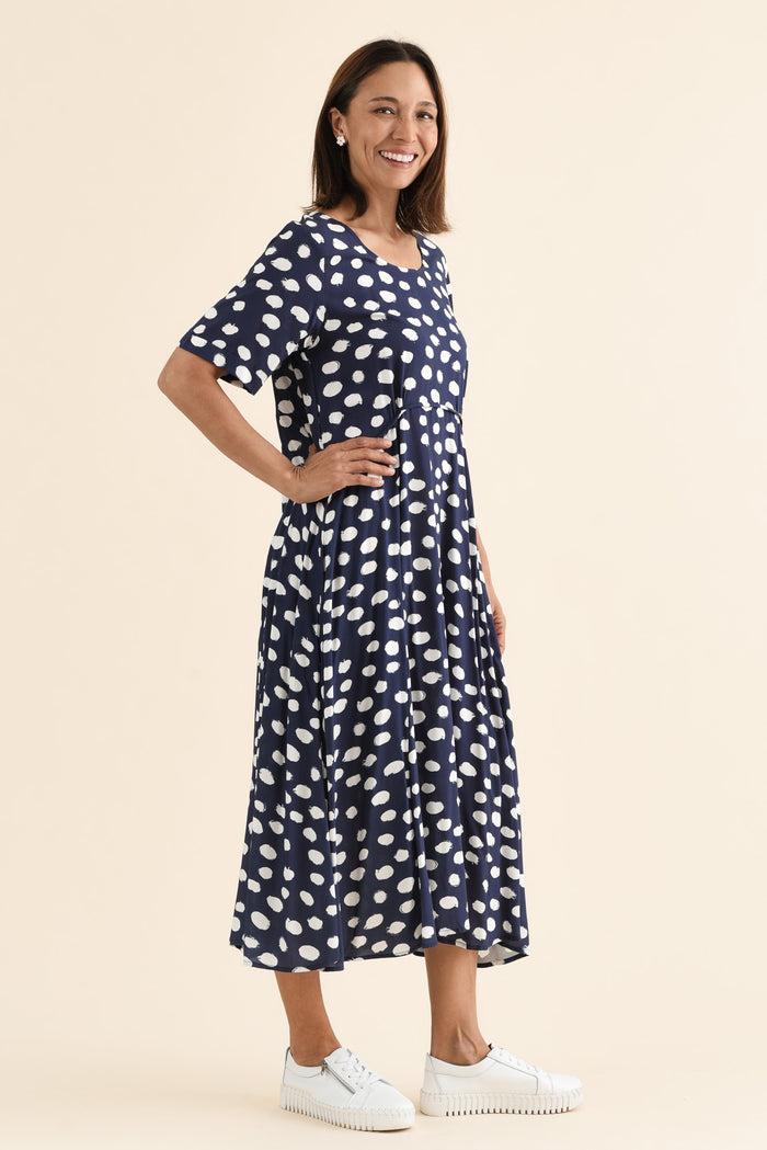Zaelia Navy Spot Crescent Dress,Side,Brunette model,alt text|model:Cara